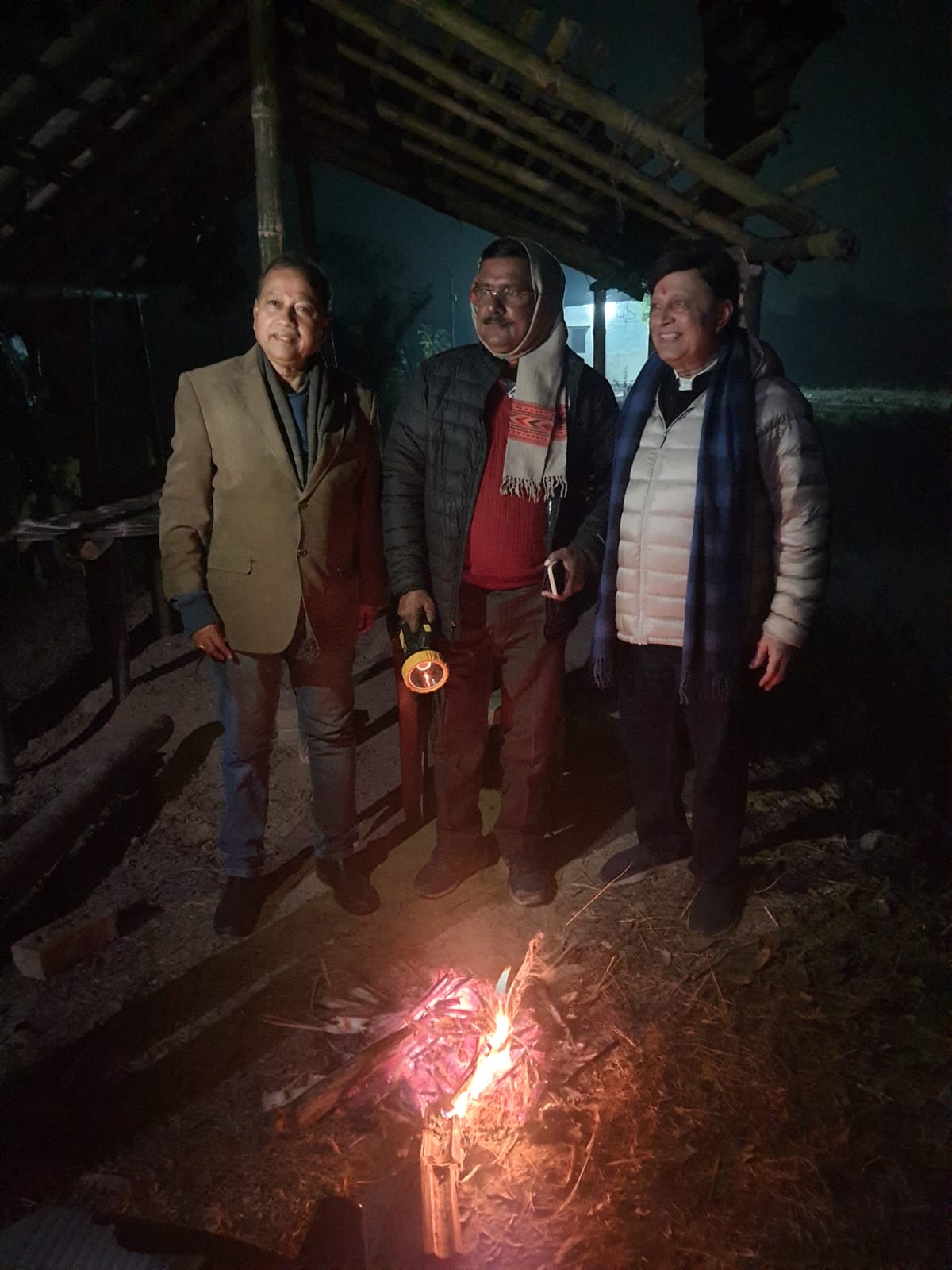 Shri Sanjay Kumar Srivastava and Shri Ajit Kumar Jha around the evening bonfire at Mithila Meadows